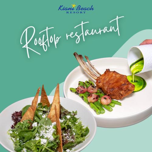 a couple of plates of food on a table at Kiani Beach Resort Family All Inclusive in Kalyves
