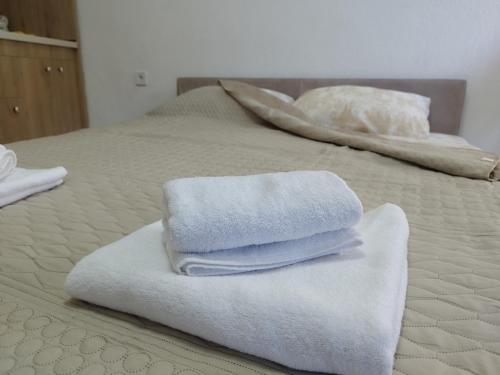 Кровать или кровати в номере Apartments Skadar Lake