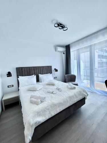 Ένα ή περισσότερα κρεβάτια σε δωμάτιο στο Hotel Sonmez