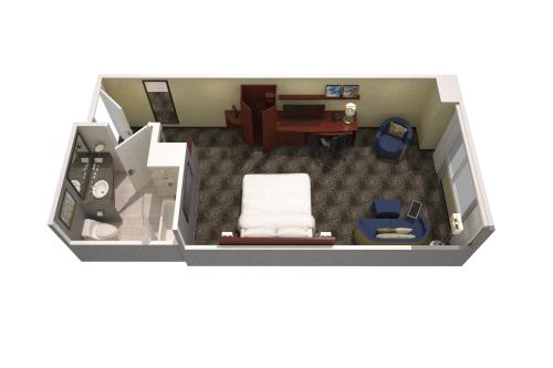 a small floor plan of a room with a living room at Courtyard by Marriott Montreal Airport in Dorval