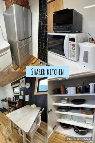 a kitchen with a table and a microwave and a counter top at Fuji Dome Glamping in Fujikawaguchiko