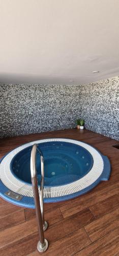 a swimming pool with a chair in a room at La Manga beach has everything in San Javier