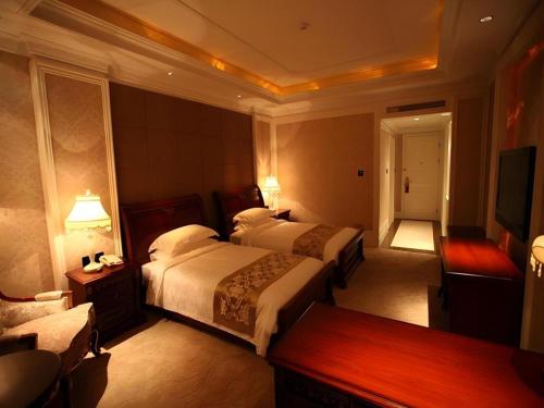 Letto o letti in una camera di GreenTree Inn Changshu South HaiYu Road Pedestrian Street Business Hotel