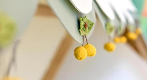 a bunch of lemons on a knife and fork at Huafa Executive Apartment Hotel Zhuhai in Zhuhai
