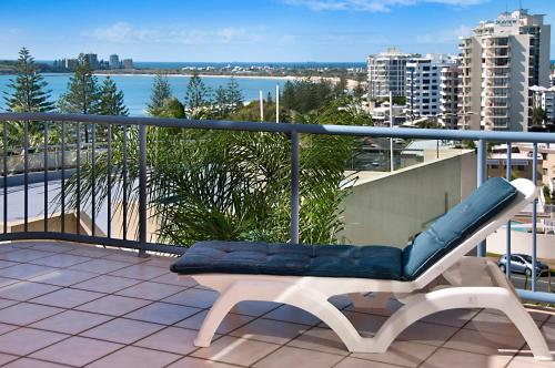a bench sitting on top of a balcony at Alexandra on the Pacific in Mooloolaba