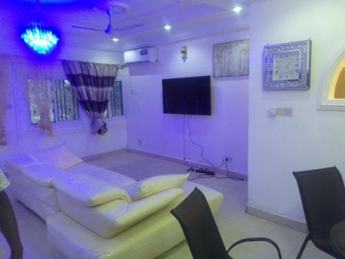 Телевизор и/или развлекательный центр в MD guest house