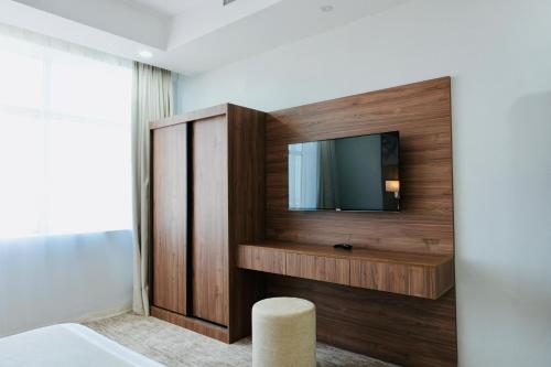 TV a/nebo společenská místnost v ubytování Duraat Al Anoud Served Apartments