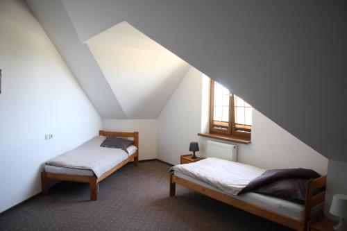 Ένα ή περισσότερα κρεβάτια σε δωμάτιο στο Constans