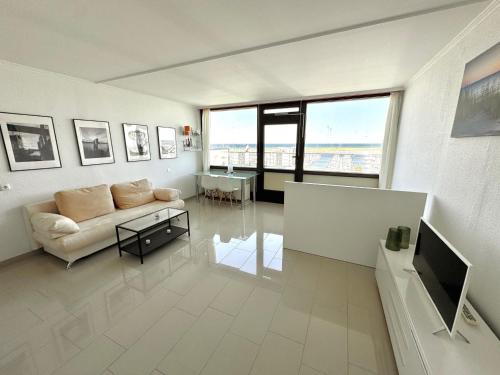 TV a/nebo společenská místnost v ubytování Ferienwohnung Oceanview Marina Wendtorf