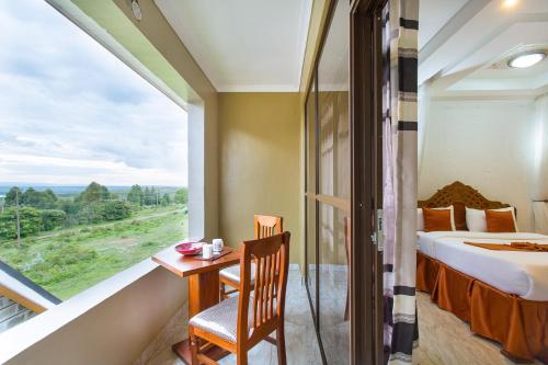 Postel nebo postele na pokoji v ubytování Epashikino Resort & Spa
