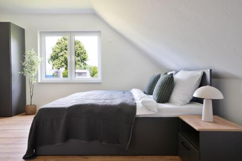 Katil atau katil-katil dalam bilik di Schöne Apartments in Lohne I home2share