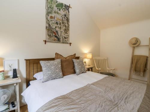 Ένα ή περισσότερα κρεβάτια σε δωμάτιο στο The Little Loft