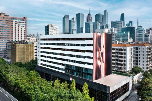 a view of a building with a city in the background at KSpace KaiShi hotel in Guangzhou