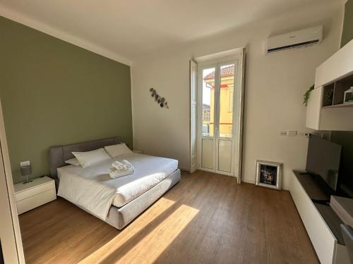 Ένα ή περισσότερα κρεβάτια σε δωμάτιο στο Arrietty's apartment