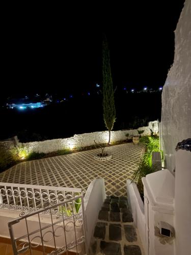 a view of a patio at night with lights at Casa Hugo in Chefchaouene