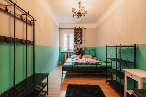 a bedroom with two bunk beds and a chandelier at Ferienhaus mit Disco, Whirlpool und vielem mehr in Oed