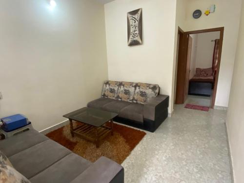 Χώρος καθιστικού στο KOKARI,S 102 2 BHK HOME STAY by AL MANAL