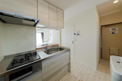 Shimoshinmei Apartment by Tranova