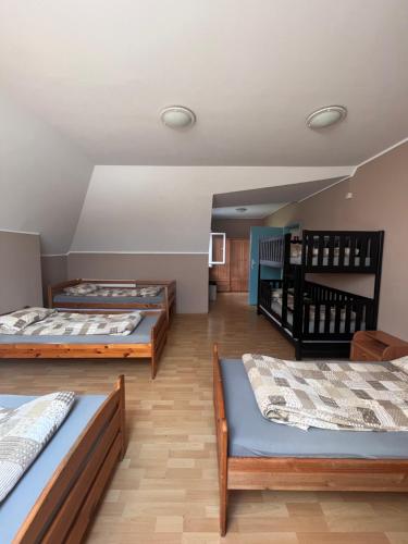 Postel nebo postele na pokoji v ubytování Sport Kompleks