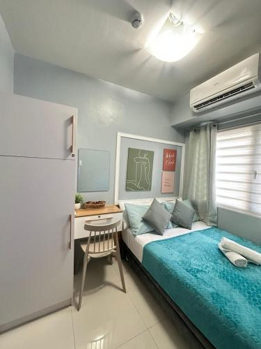 Ένα ή περισσότερα κρεβάτια σε δωμάτιο στο Mall of Asia shore 3 Tower 21661 Residence