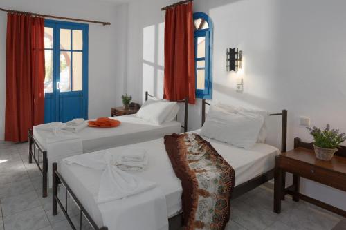 Ένα ή περισσότερα κρεβάτια σε δωμάτιο στο Palm Bay Sissi Hotel