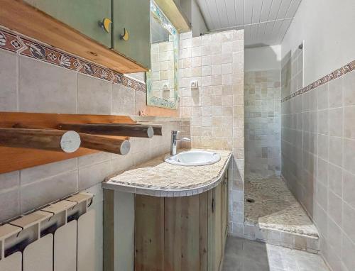 a bathroom with a sink and a toilet in it at Balcon Sud, Parking Privé, 4 Chambres Proche Plage in Le Pradet