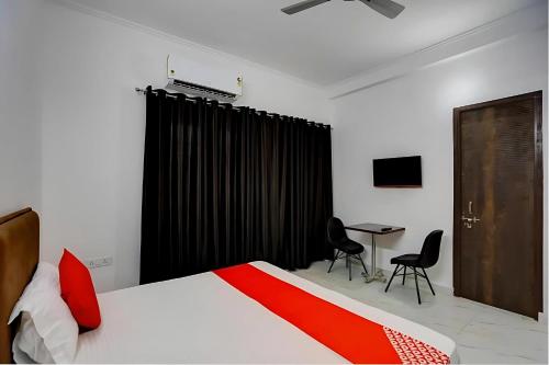 Postel nebo postele na pokoji v ubytování Belle Vista Regency