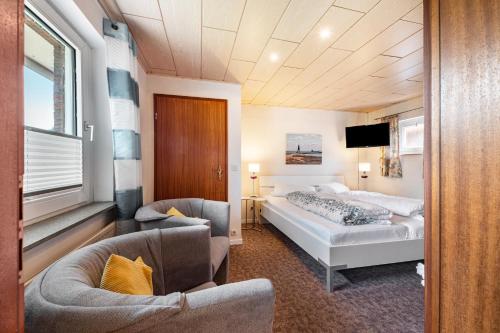 Ένα ή περισσότερα κρεβάτια σε δωμάτιο στο Marion Wilckens