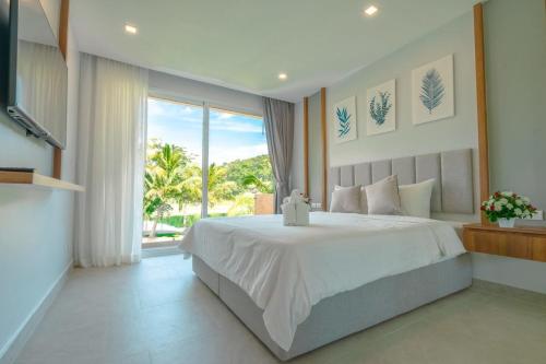 Katil atau katil-katil dalam bilik di Perla Pool Villa - Koh Chang