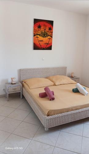 a bed with two pillows on it in a room at Pandora Ocena View II in Sal Rei