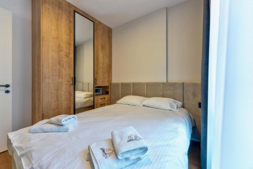 En eller flere senge i et værelse på Apartman & Spa Lukas Zlatibor