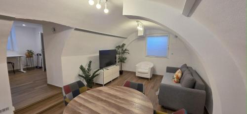 Foto The Modern Cave Lodge - ComfyHome Apartments Stuttgart 5