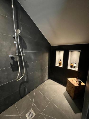 a bathroom with a shower and a sink at Duplex MontBlanc - Suite, Centre & Parking by AlpenlySallanches in Sallanches