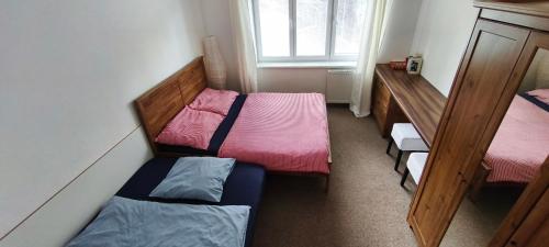 Una cama o camas en una habitación de ROOM IN TREBON