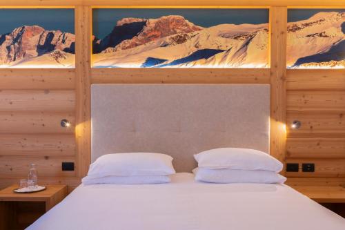 Postel nebo postele na pokoji v ubytování Hotel Lagorai Resort & Spa