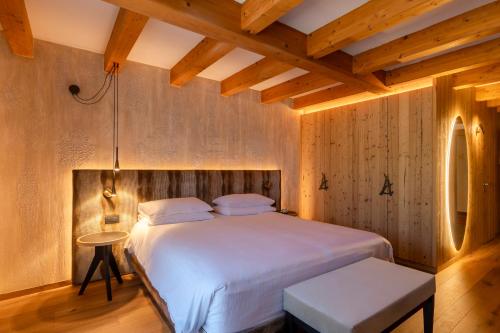 Postel nebo postele na pokoji v ubytování Hotel Lagorai Resort & Spa