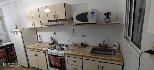 Kuchyň nebo kuchyňský kout v ubytování RcQ