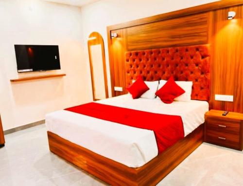 Hotel Jay ambey palace In Jaipurにあるベッド