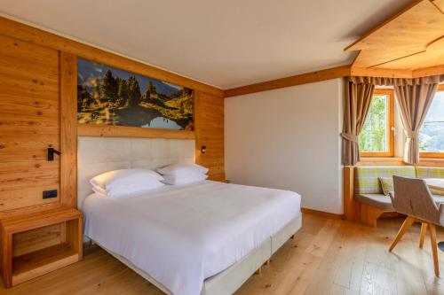 Postel nebo postele na pokoji v ubytování Hotel Lagorai Resort & Spa