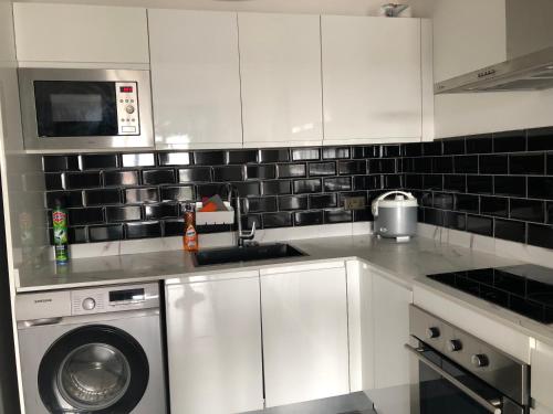 Dapur atau dapur kecil di Dac Apartments