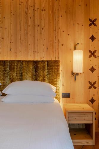 Postel nebo postele na pokoji v ubytování Hotel Lagorai Resort & Spa