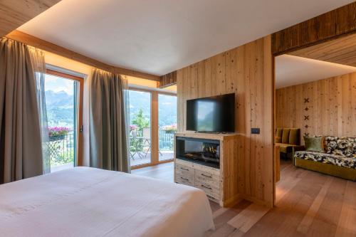 TV a/nebo společenská místnost v ubytování Hotel Lagorai Resort & Spa