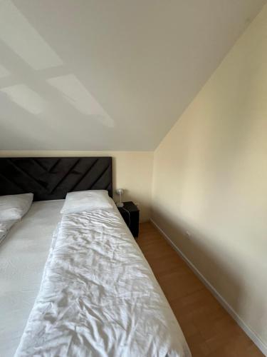 Ένα ή περισσότερα κρεβάτια σε δωμάτιο στο 4-Bedroom House & Large Garden