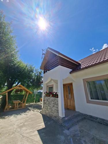 a house with the sun in the sky at Altan's Gold in Hangul