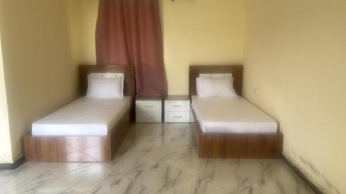 Postel nebo postele na pokoji v ubytování Auberge nadia