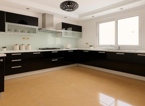 a kitchen with black and white cabinets and a window at Appartement Charmant à Hydra in Hydra