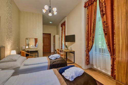 Főnix Wellness Resortにあるベッド