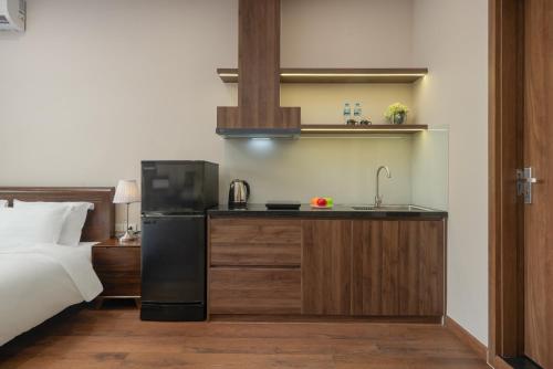 Kuchyň nebo kuchyňský kout v ubytování Fuji Apartment Hoàn Kiếm