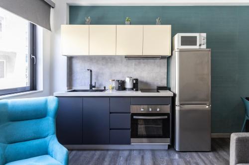 Cucina o angolo cottura di Stay Kula Aparthotel city center