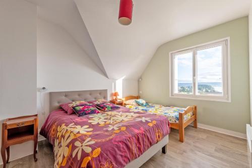Postel nebo postele na pokoji v ubytování Grande Maison Familiale - vue mer
